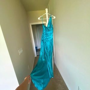 Beautiful turquoise one shoulder gown!